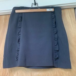 Perfect grey mini skirt with ruffle detail!